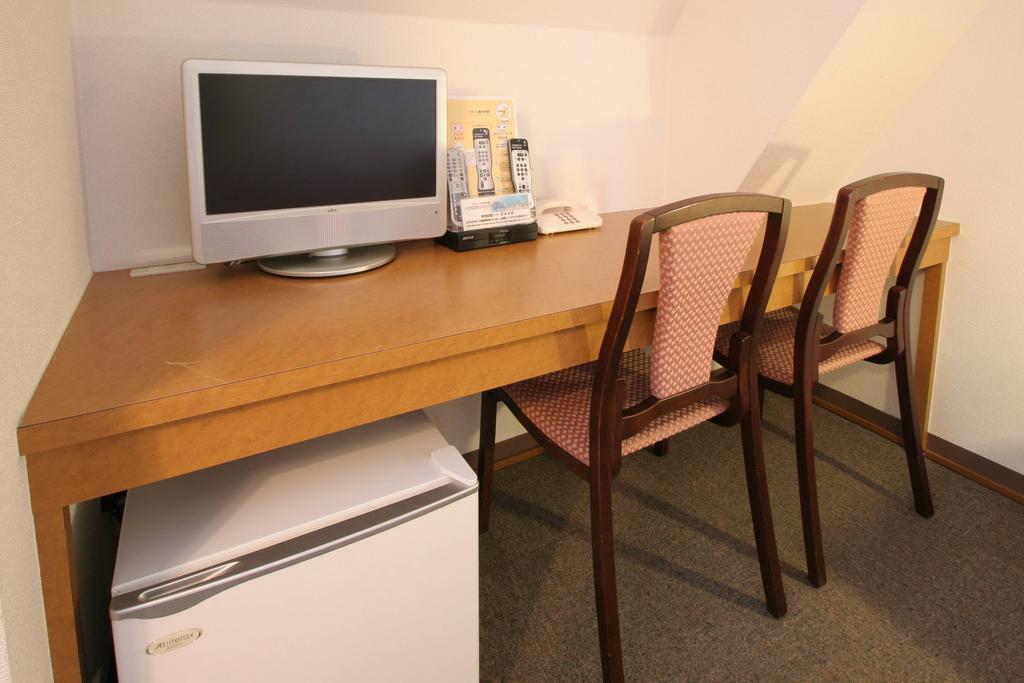 Sakura Hotel Ikebukuro Токио Номер фото